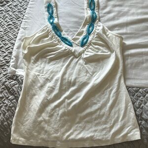 WHITE HOUSE BLACK MARKET Tank top with aqua blue beaded design on front.